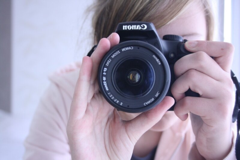 Person Holding Camera — Black, Neutral, Photograph, Hands