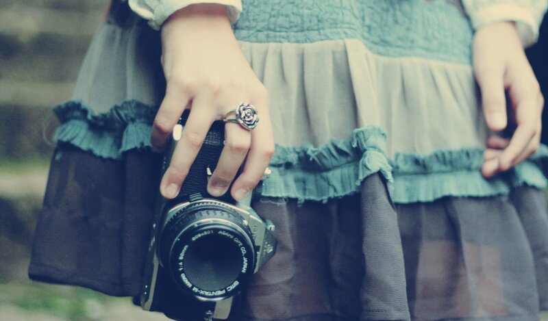Person Holding Camera — Blue, Calm, Photograph, Ring