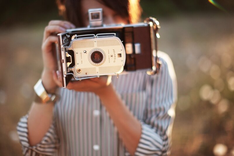 Person Holding Camera — Brown, Calm, Sunset