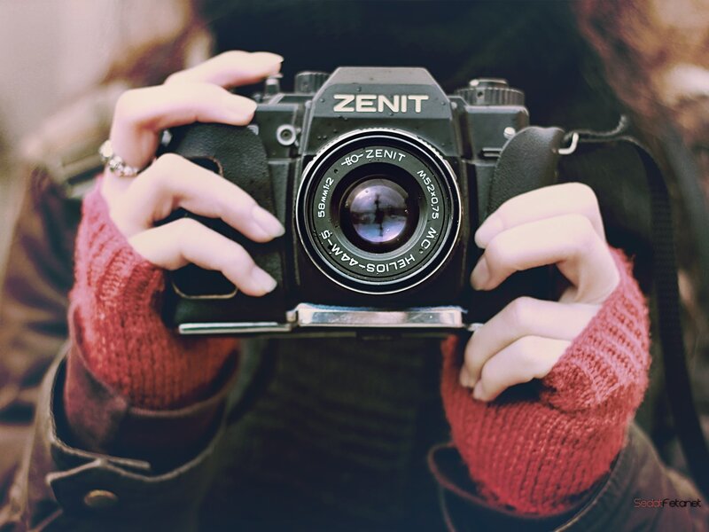 Person Holding Camera — Calm