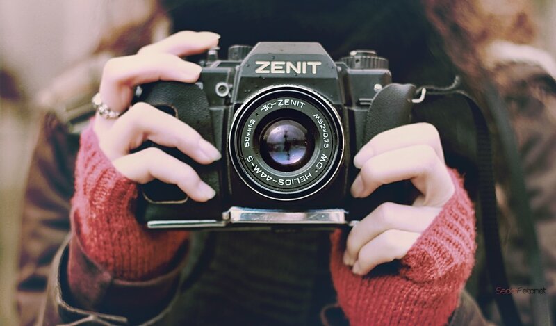 Person Holding Camera — Red, Calm, Photograph