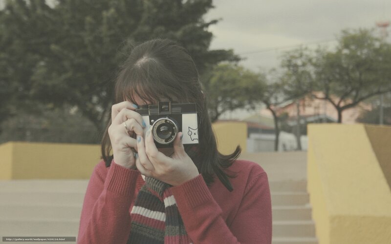Person Holding Camera — Red, Calm