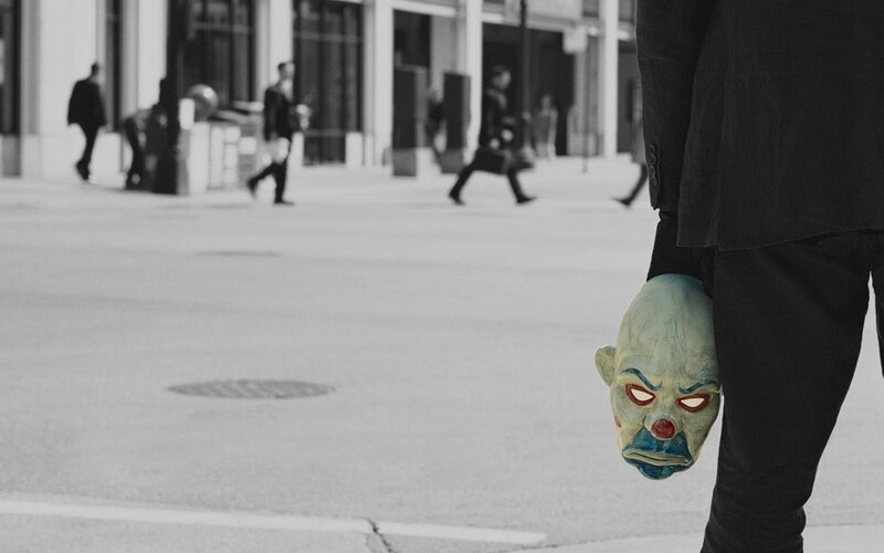 Person Holding Clown Mask — Black