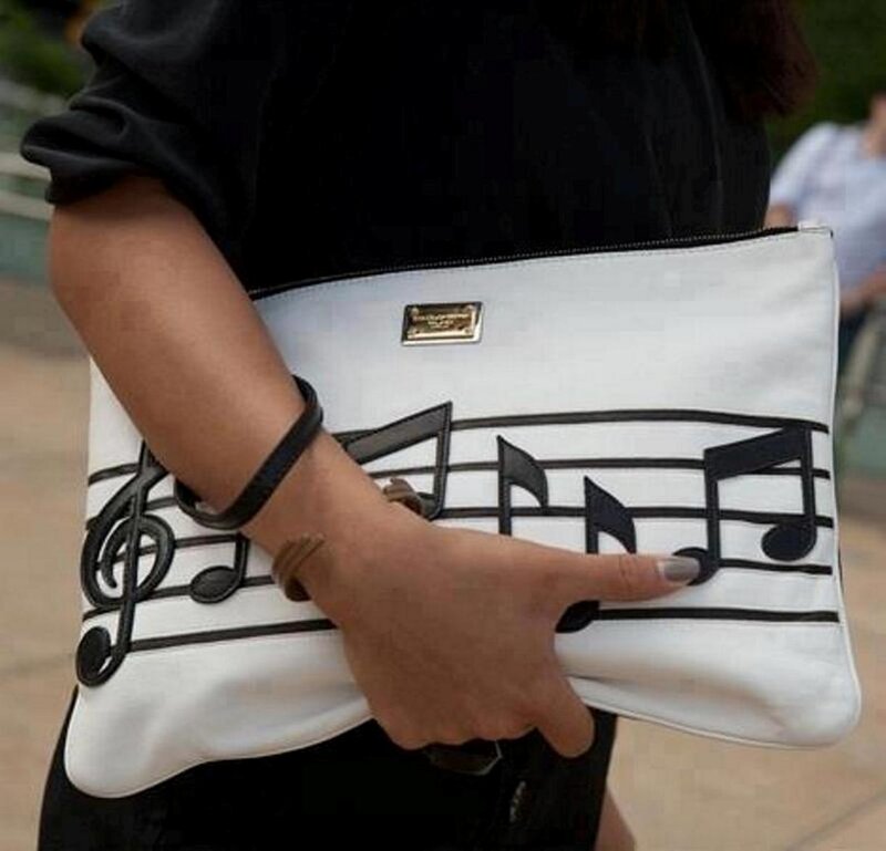Person Holding Clutch