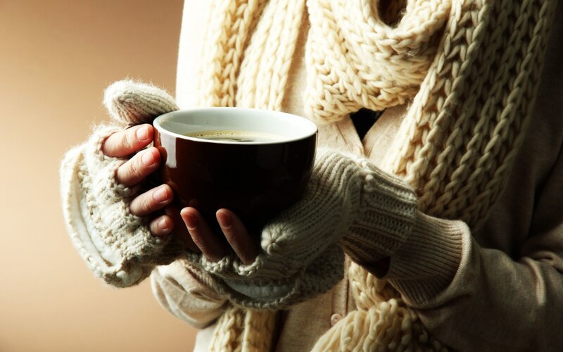Person Holding Coffee Cup — Beige