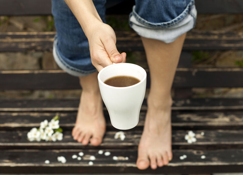 Person Holding Coffee Cup — White, Calm