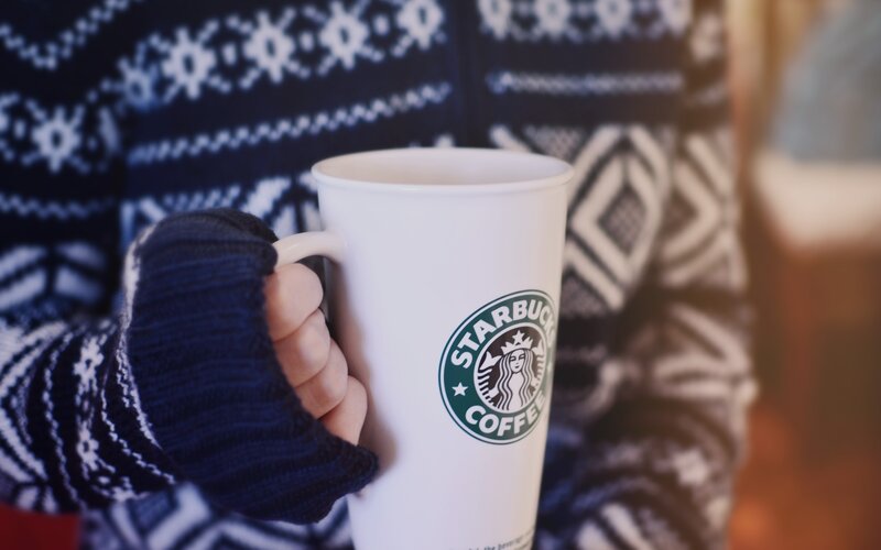 Person Holding Coffee Cup — White, Cozy, Winter