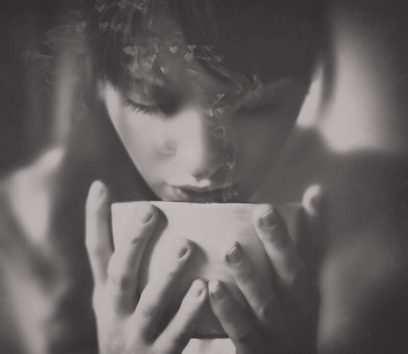 Person Holding Cup