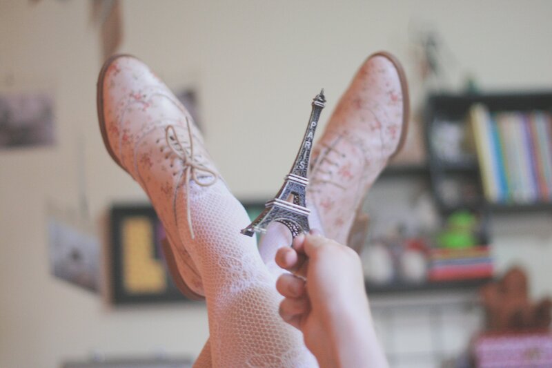 Person Holding Eiffel Tower