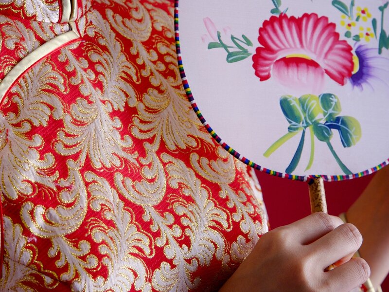 Person Holding Fan