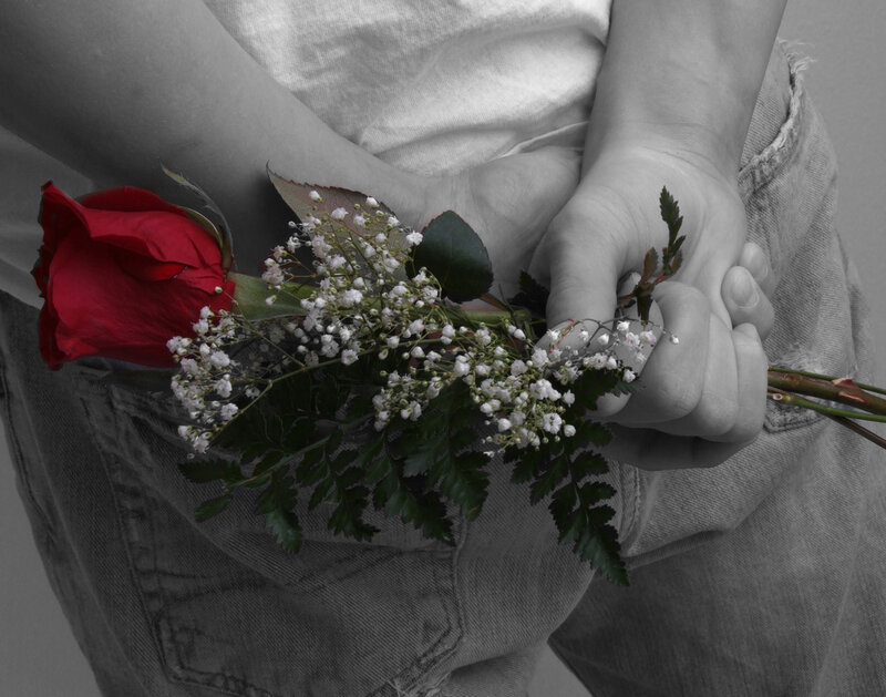 Person Holding Flowers — Red