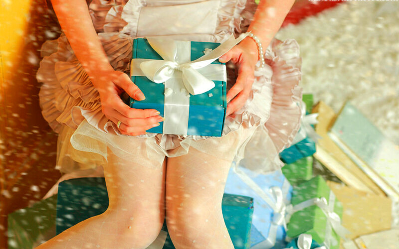 Person Holding Gift Box — Blue