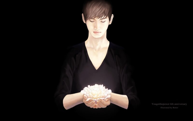 person holding glowing flower