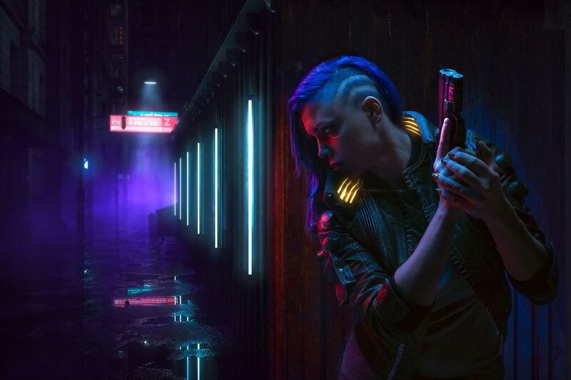 Person Holding Gun — Blue