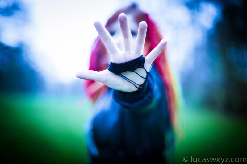 person holding hand forward