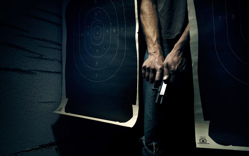 Person Holding Handgun