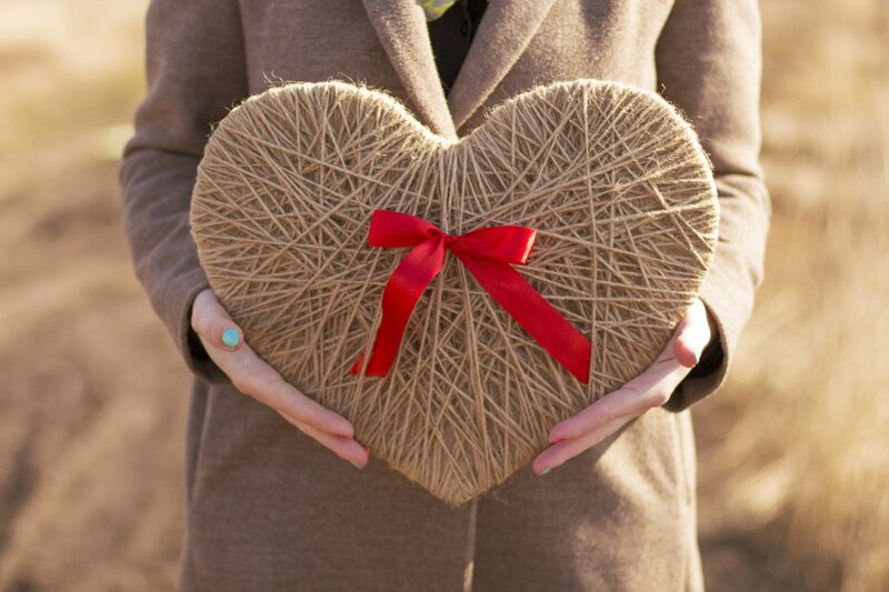 Person Holding Heart — Brown