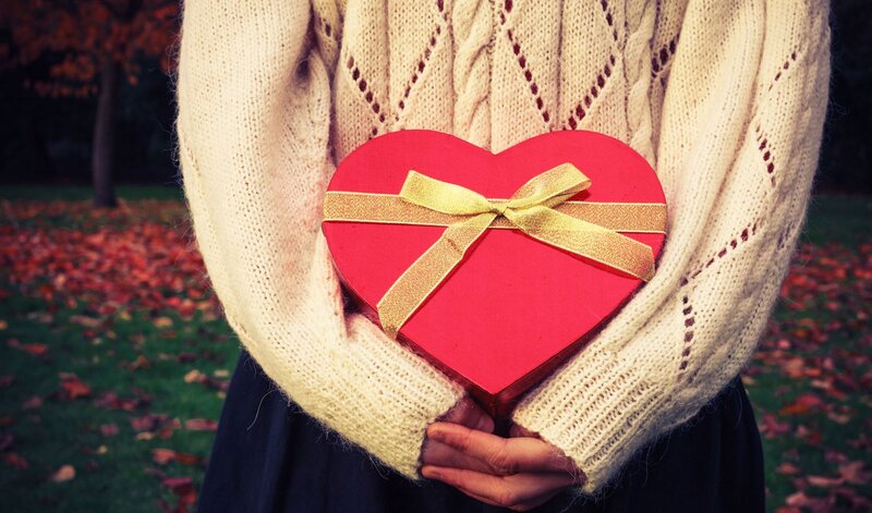 Person Holding Heart Gift