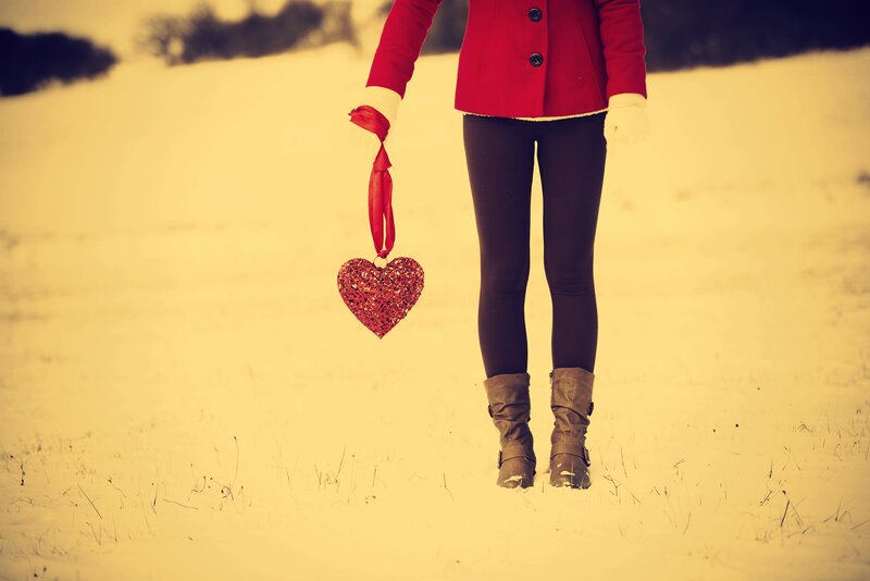 Person Holding Heart Ornament