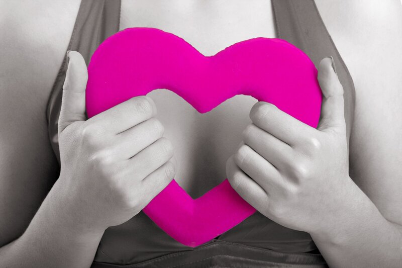 Person Holding Heart — Pink