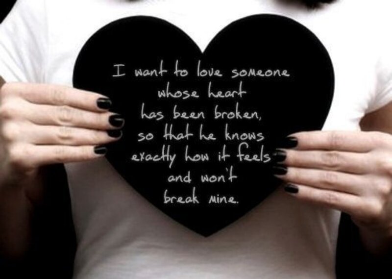 Person Holding Heart Sign