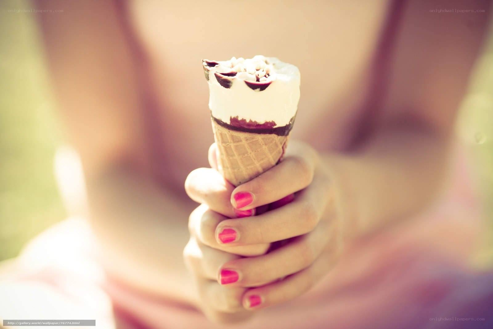 person holding ice cream cone