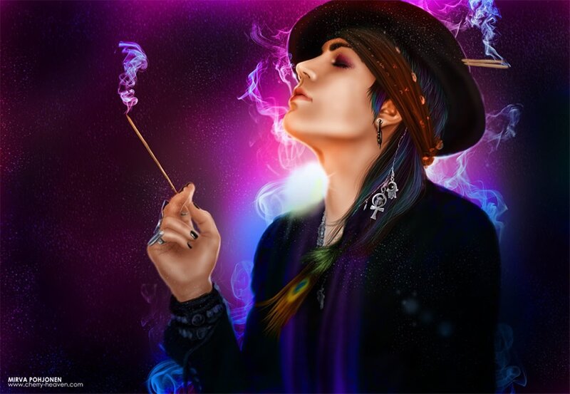 Person Holding Incense Stick