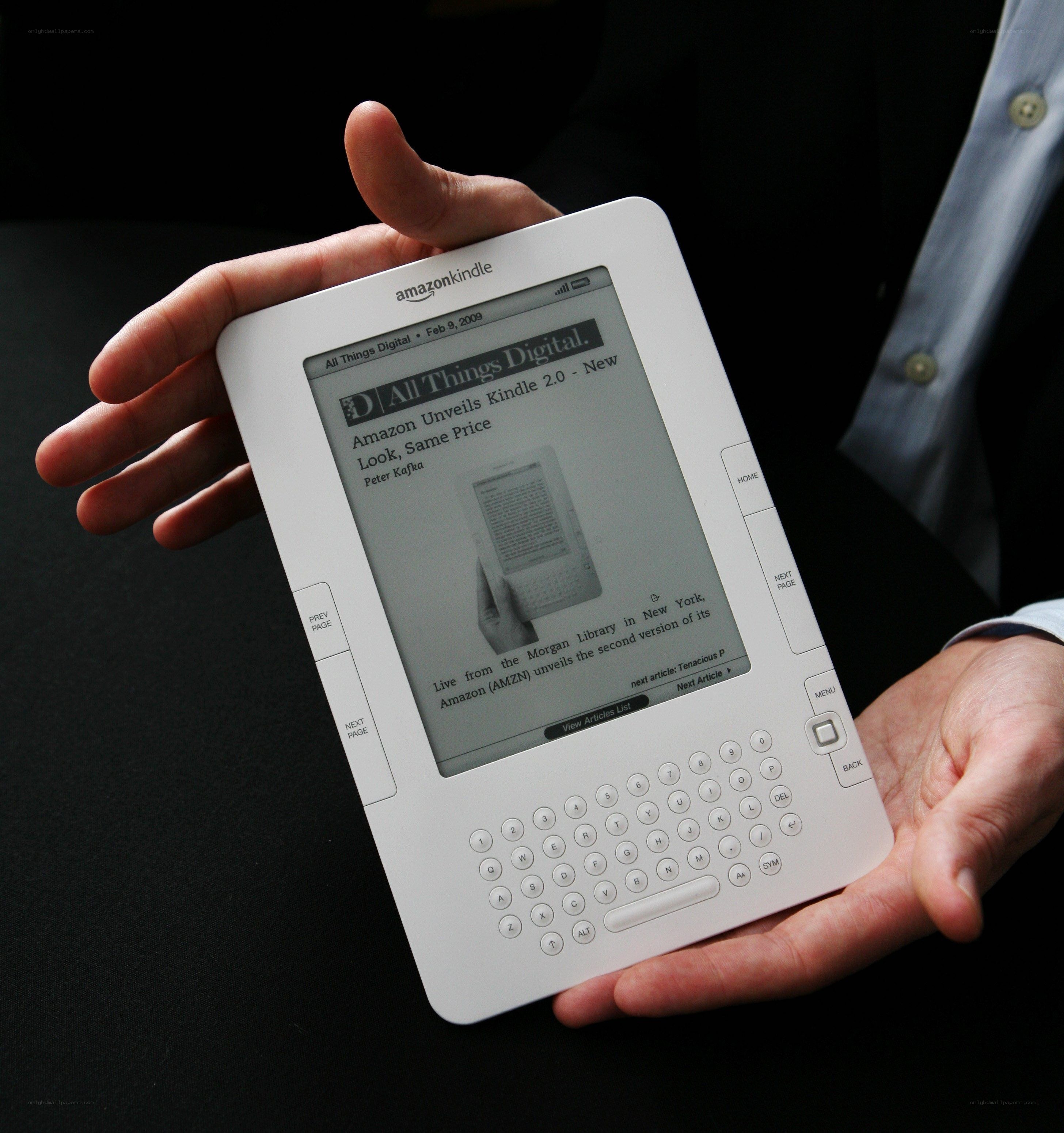 Person holding Kindle e-reader