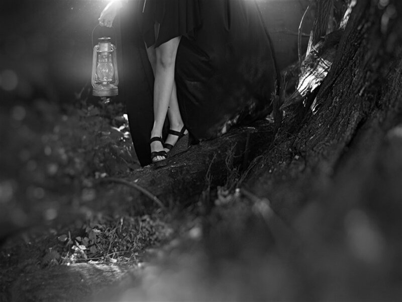 Person Holding Lantern — Black