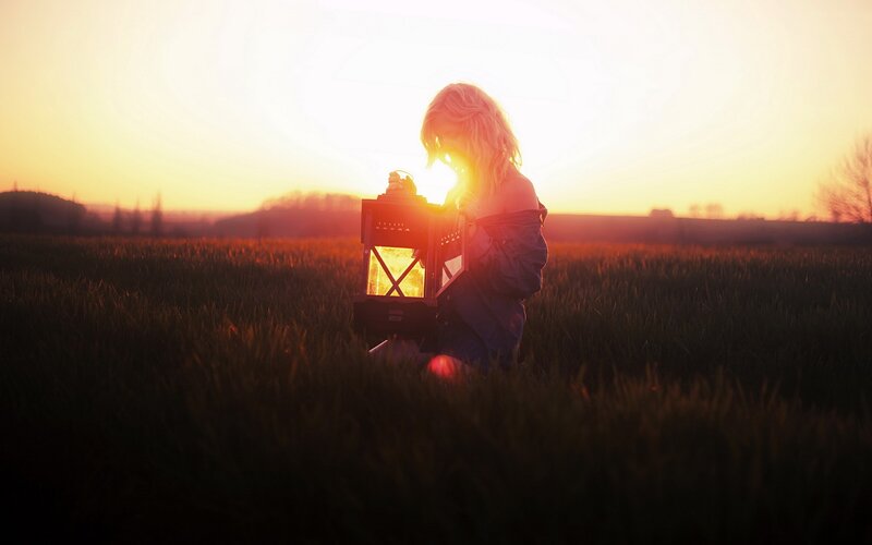 Person Holding Lantern — Orange, Serene