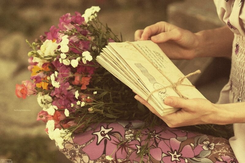 Person Holding Letters