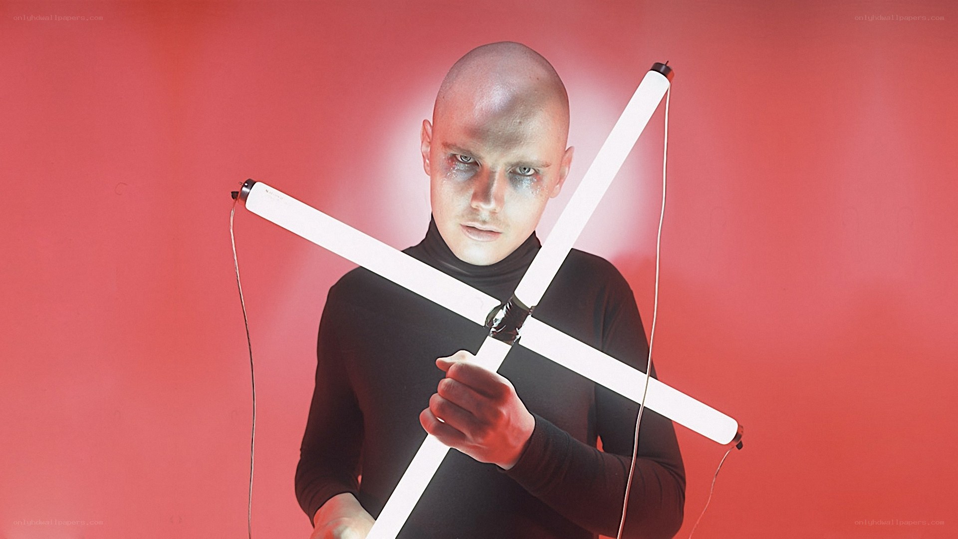 person holding light sticks