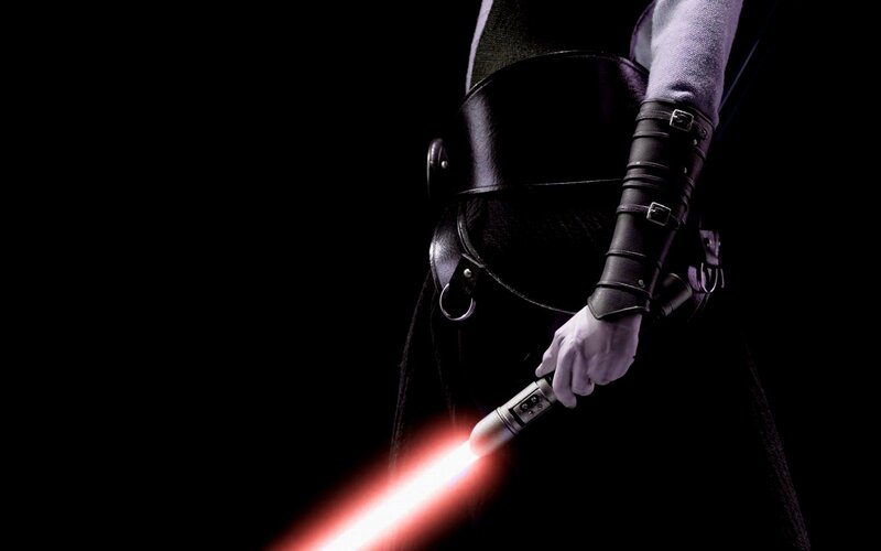 Person Holding Lightsaber — Black, Dramatic