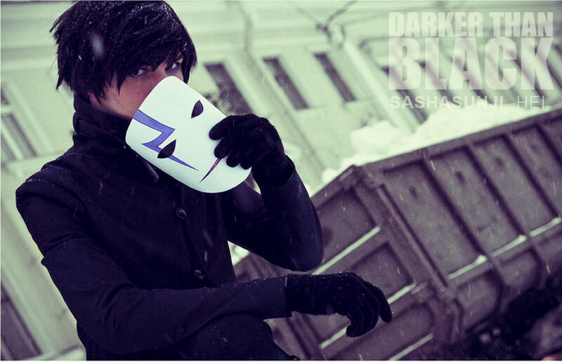 Person Holding Mask — Black