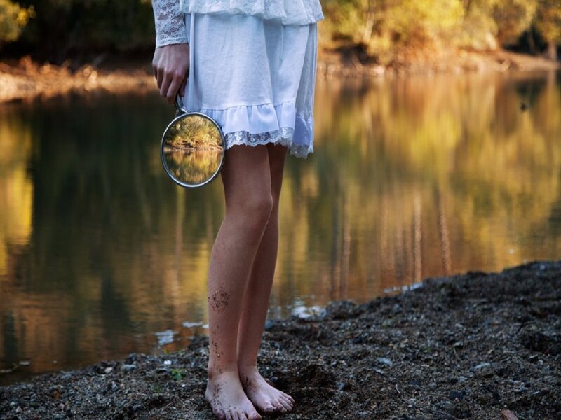Person Holding Mirror — White