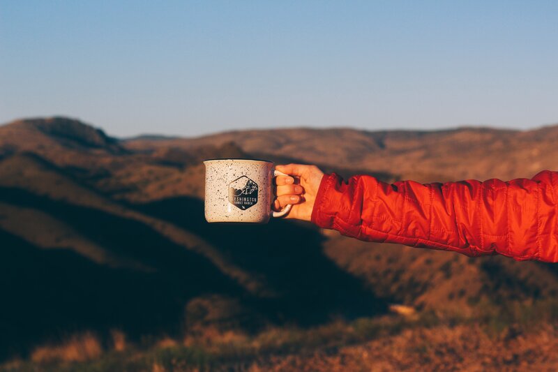 Person Holding Mug — Red, Serene