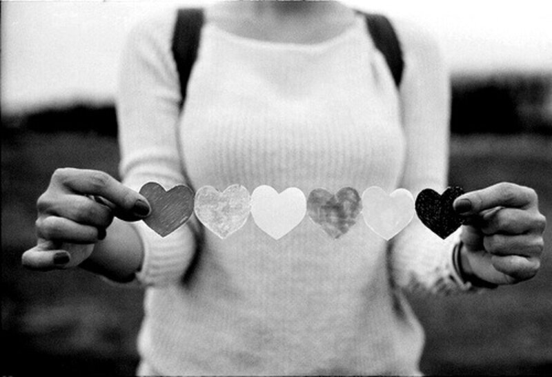 Person Holding Paper Hearts