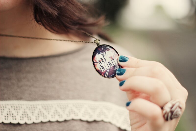 Person Holding Pendant