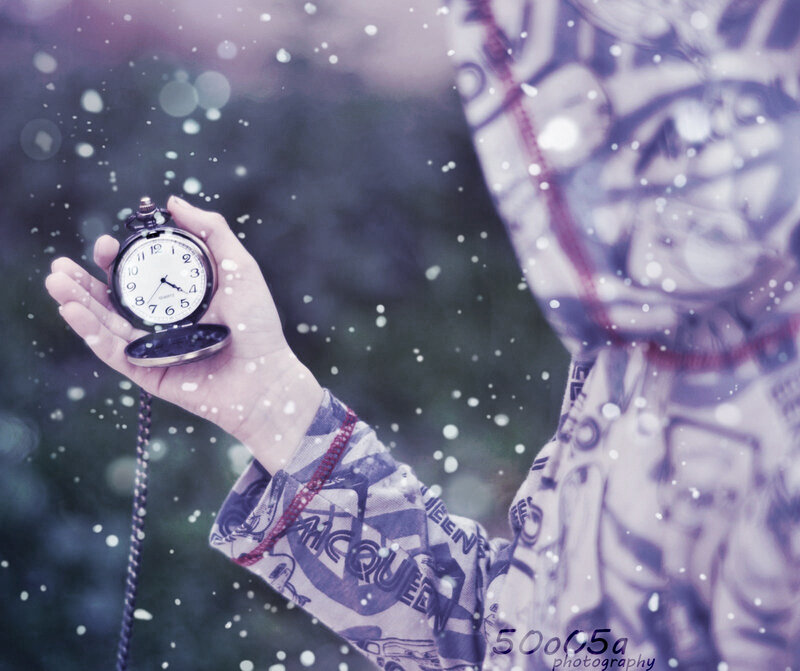Person Holding Pocket Watch — Purple