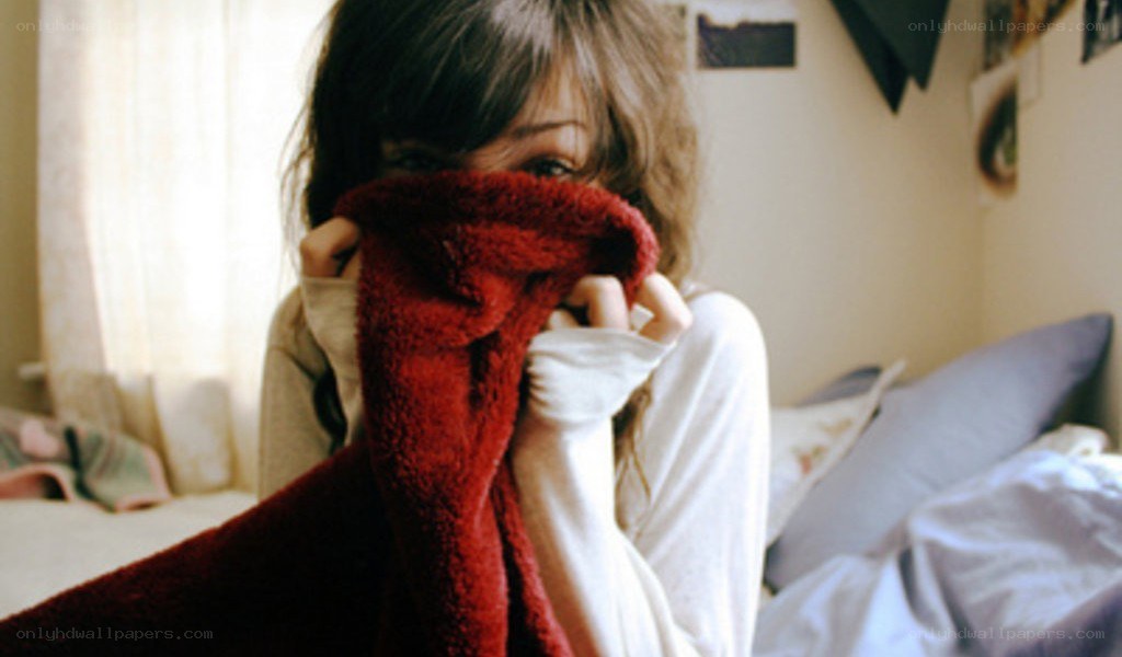 person holding red blanket