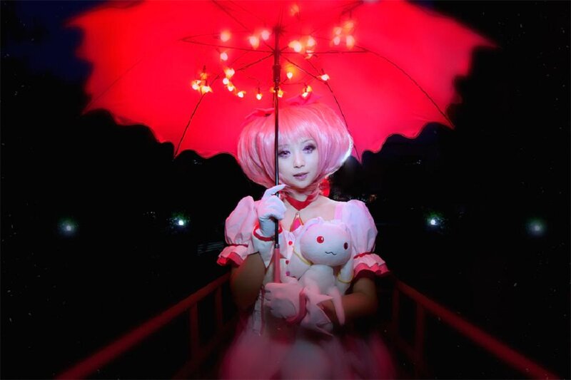 Person Holding Red Umbrella