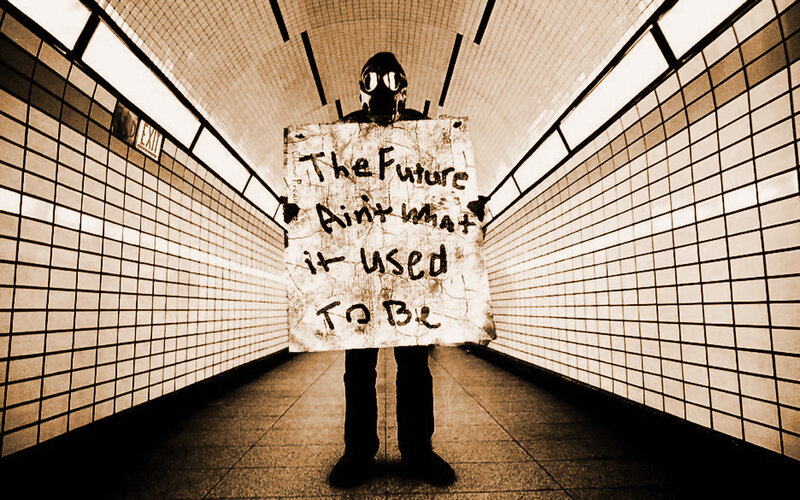 person holding sign in subway