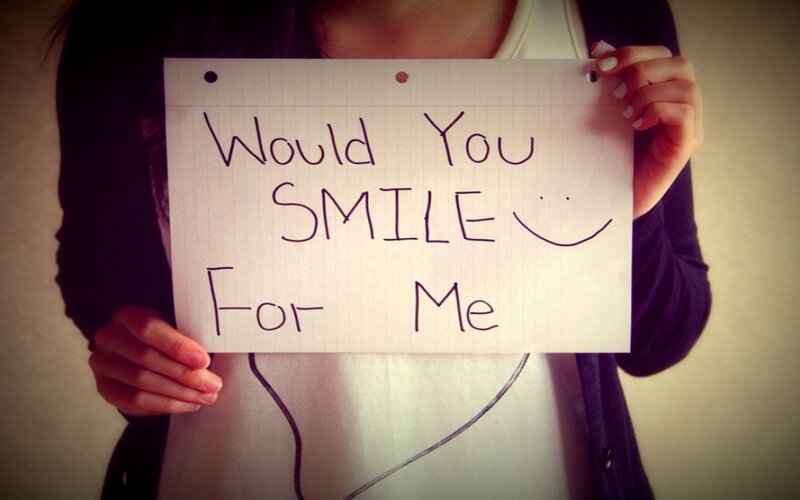 Person Holding Sign — White, Neutral, Photograph