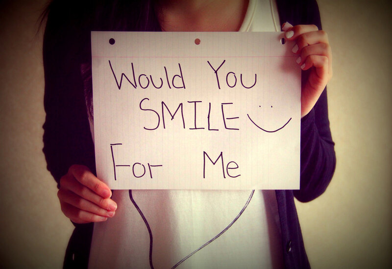 Person Holding Sign — White
