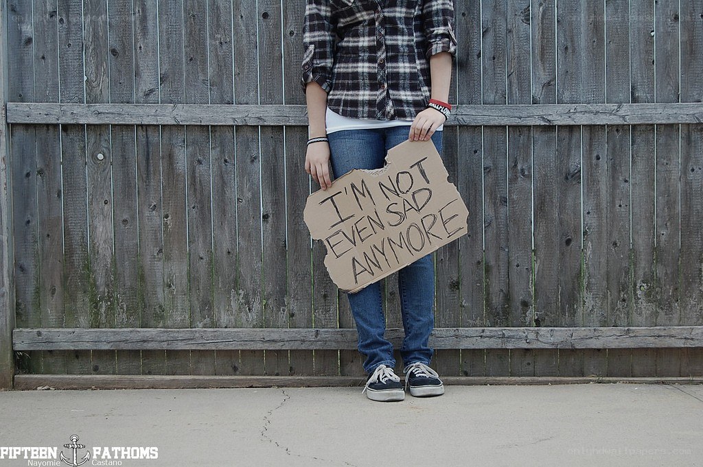 person holding sign