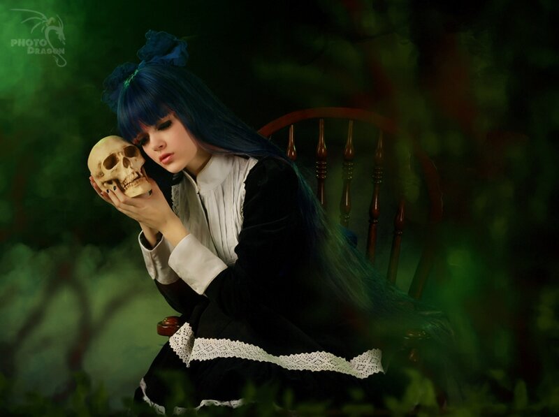 Person Holding Skull
