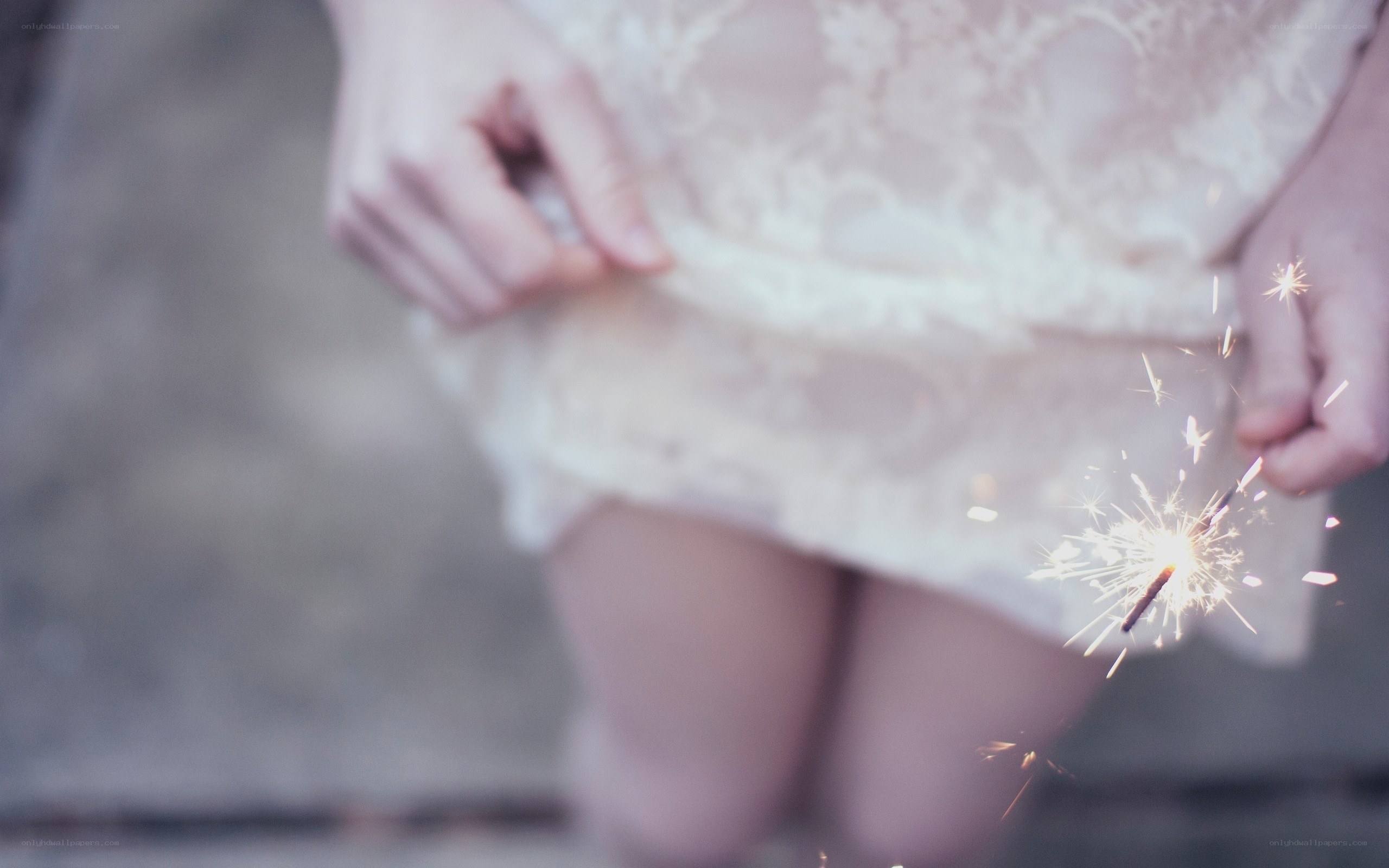 person holding sparkler