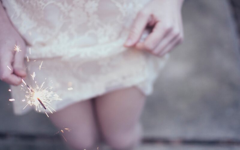 person holding sparkler