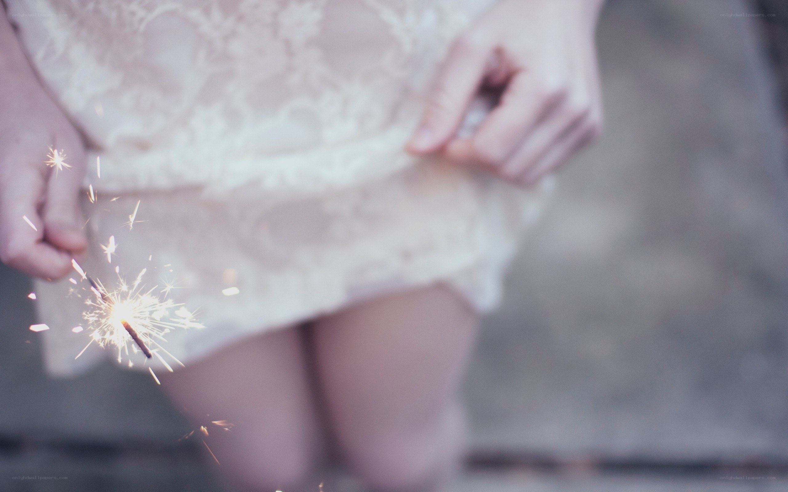 person holding sparkler
