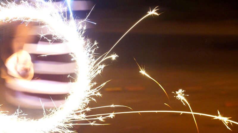 Person Holding Sparkler — White